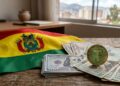 Bandera de Bolivia junto a una moneda de USDT y dólares en efectivo.