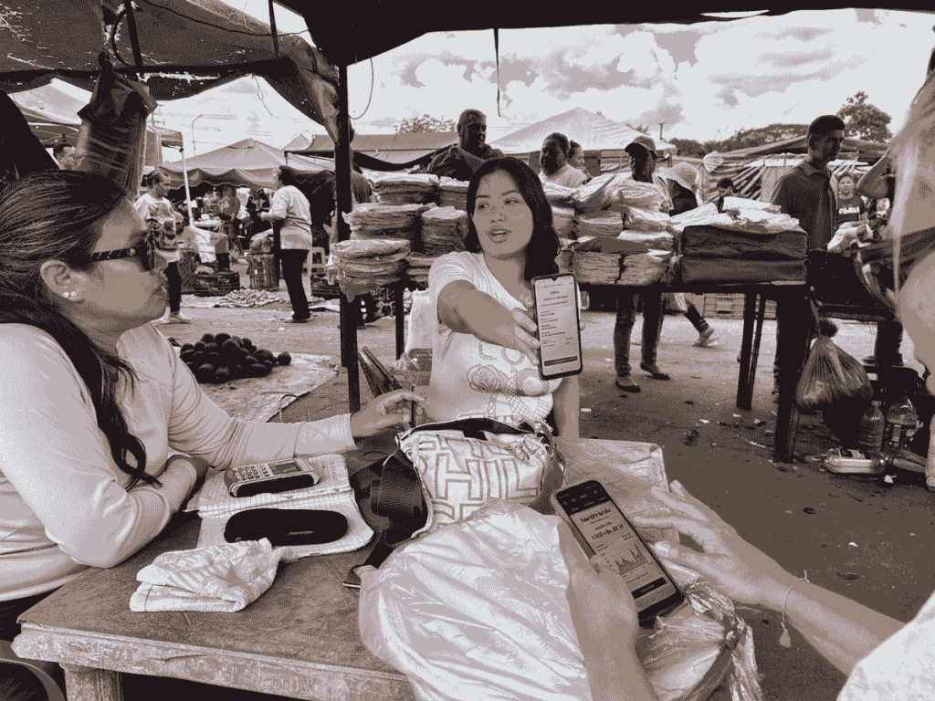 A person makes a payment in USDT in a popular market in Venezuela.