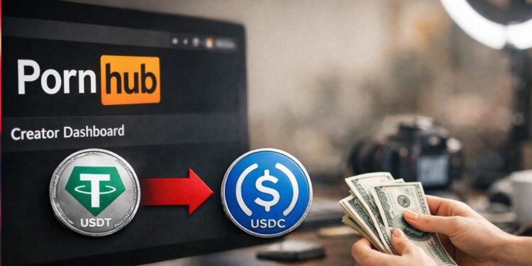 Pantalla de Pornhub mostrando transición de USDT a USDC para pagos a creadores.