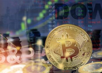 Monedas de bitcoin acompañada de gráficos bursátiles.