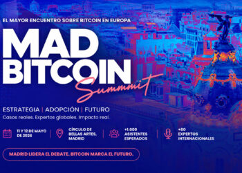 Banner promocional de MadBitcoin Summit 2026, con la ciudad de Madrid de fondo arriba a la derercha, en medio tono azul y naranja
