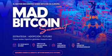 Banner promocional de MadBitcoin Summit 2026, con la ciudad de Madrid de fondo arriba a la derercha, en medio tono azul y naranja