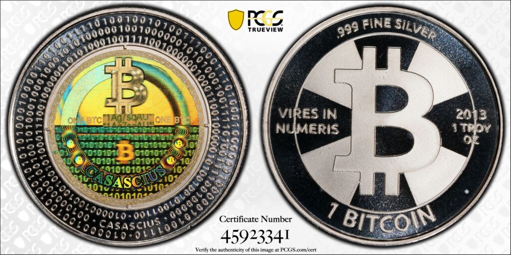 Moneda física Casascius de 1 Bitcoin mostrada por ambas caras.