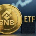 Moneda dorada de BNB con las letras ETF al lado.