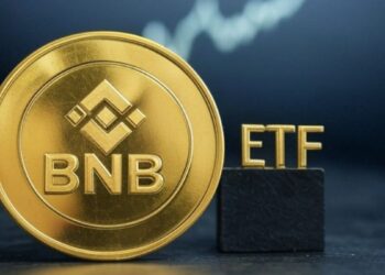Moneda dorada de BNB con las letras ETF al lado.