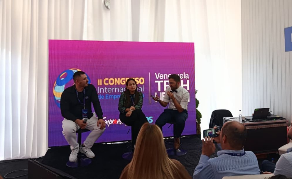 Photograph of the Bitfinex and BitGo panel at Venezuela Tech Week.
