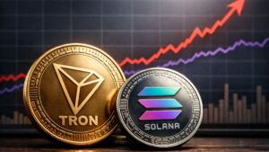 Monedas de Tron y Solana frente a gráfico financiero donde Tron supera a Solana en usuarios activos diarios.