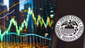 Gráfico de precio genérico y teléfono móvil con el logo de la Fed.