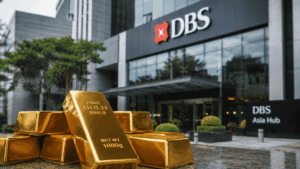 En primer plano: lingotes de oro. En el fondo: oficina corporativa de DBS.