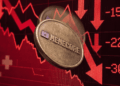 Moneda con el logo de memecore cayendo.