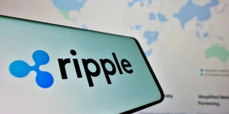Pantalla de teléfono que refleja el logo de Ripple.