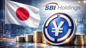 Moneda física de JPYSC, acompañada de una bandera de Japón y el logotipo de SBI Holdings.