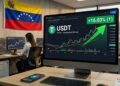 Pantalla de PC con gráfica de USDT con la bandera de Venezuela y una gráfica que muestra un aumento de +16%.