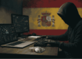 Un hacker transfiriendo fondos en USDT. Bandera de españa.