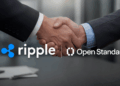 Primer planos: logos de Ripple y Open Standard. Fondo: un apretón de manos.