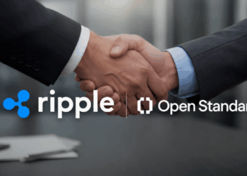 Primer planos: logos de Ripple y Open Standard. Fondo: un apretón de manos.