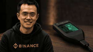Changpeng Zhao y un dispositivo de la marca Trezor.