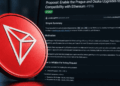 Moneda física de Tron y repositorio de Github con la propuesta que se vota.