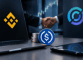 Binance y Circle representados por una alianza con monedas, una laptop y un apretón de manos.
