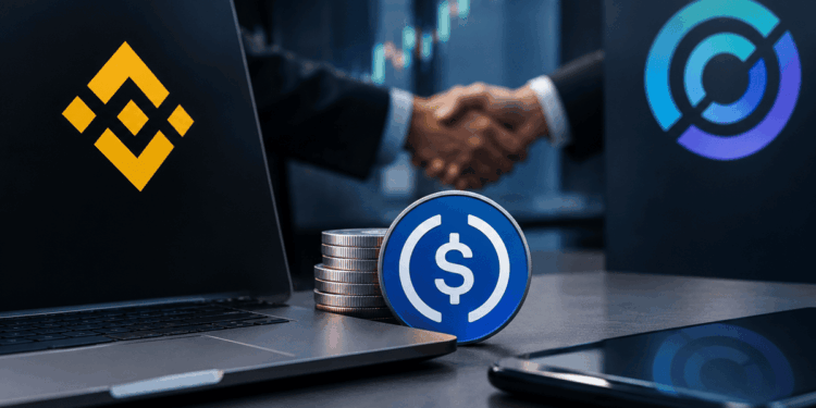 Binance y Circle representados por una alianza con monedas, una laptop y un apretón de manos.