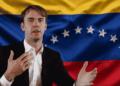 Fred Ehrsam y bandera de Venezuela.