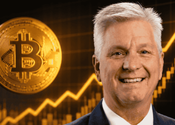 Christopher Waller y moneda de bitcoin.