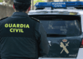 Imagen ilustrativa de un agente de la guardia civil española de espaldas.