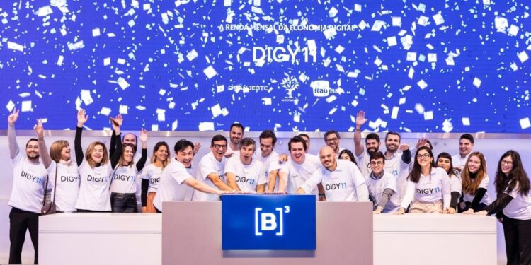 Equipo de OranjeBTC celebrando el lanzamiento del ETF DIGY11 en la Bolsa B3 de Brasil.