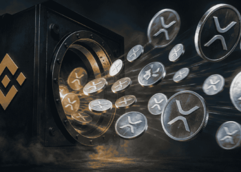Monedas de XRP saliendo de una bóveda con el logo de Binance.
