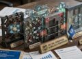 un escritorio con cuatro barreras físicas que bloquean la red digital de tokenización junto a informes del FMI.